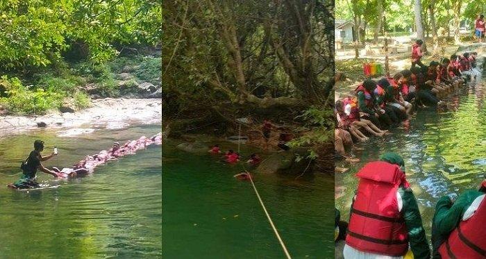 Keseruan body rafting di obyek wisata Citumang Pangandaran, Jawa Barat.