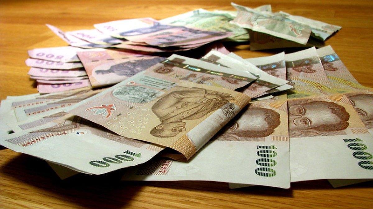 Baht, mata uang Thailand.