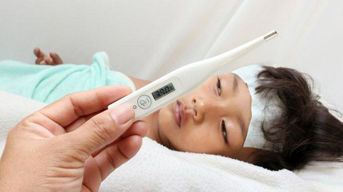 Ilustrasi seorang anak mengalami demam tinggi.