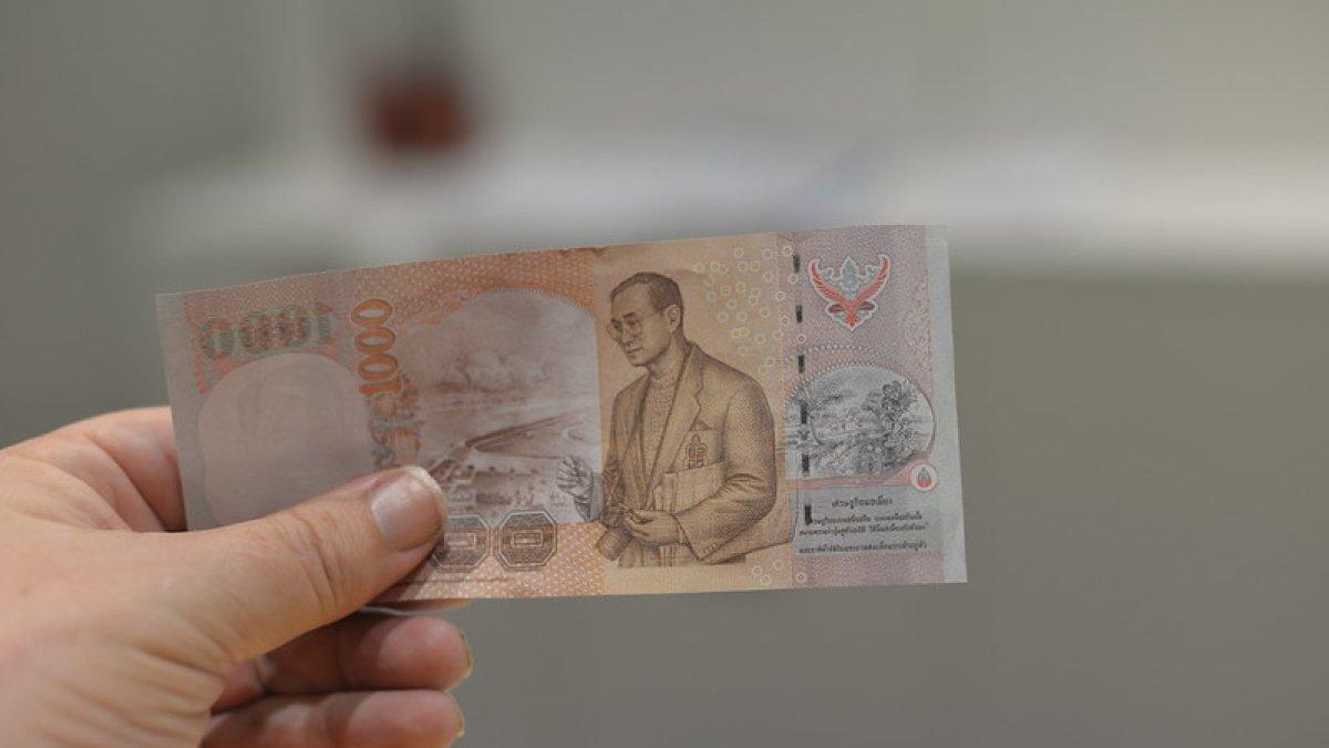 Ilustrasi mata uang baht.