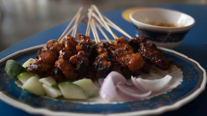 Ilustrasi sate Madura.