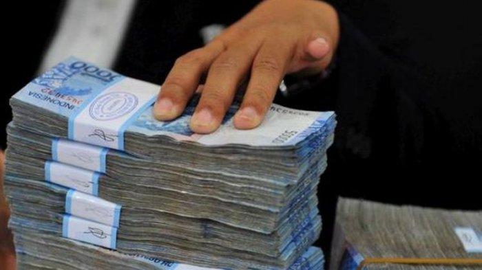 Ilustrasi tumpukan uang rupiah.