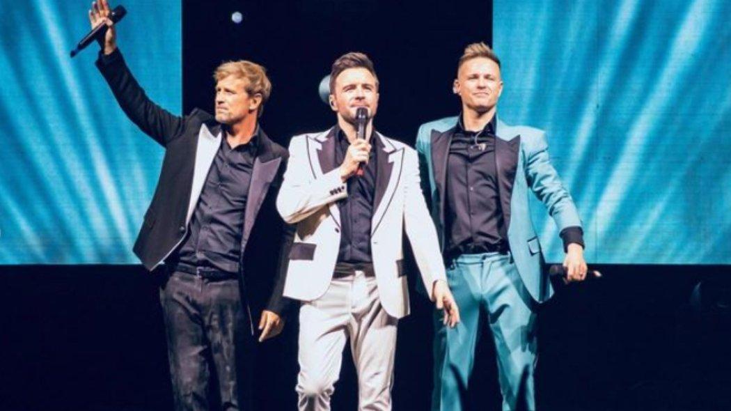 Personel Westlife dari kiri ke kanan, yaitu Kian Egan, Shane Filan, dan Nicky Byrne. Westlife akan menggelar konser tanpa Mark Feehily.