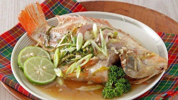 Ilustrasi tim ikan nila untuk makan malam Tahun Baru Imlek.