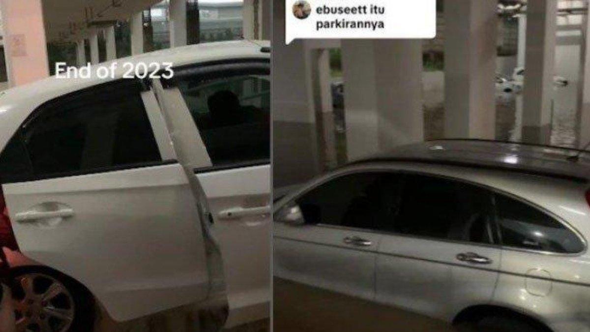 Video viral memperlihatkan puluhan mobil terendam banjir di parkiran sebuah apartemen.