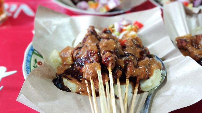 Ilustrasi hidangan sate kelinci untuk makan siang enak.