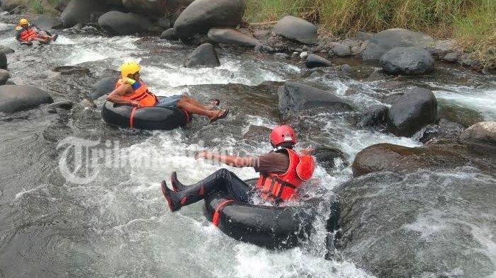Ilustrasi river tubing.