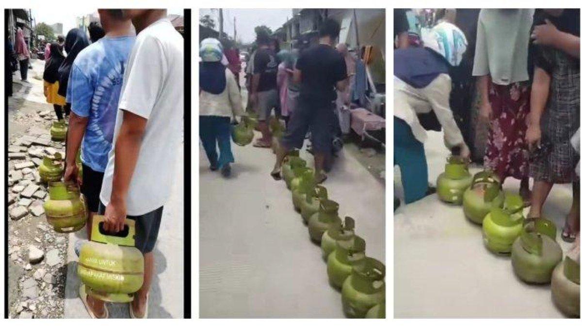 ANTREAN BELI ELPIJI 3 KG - Antrean warga membawa tabung elpiji 3 kg kosong untuk membeli elpiji baru di agen mengular sampai ke jalan di kawasan Pasar Kemis, Tangerang, Minggu, 2 Februari 2025. Mulai 1 Februari 2025 pemerintah hanya mendistribusikan elpiji bersubsidi 3 kg di agen-agen resmi dan tidak lagi menjual lewat pengecer.