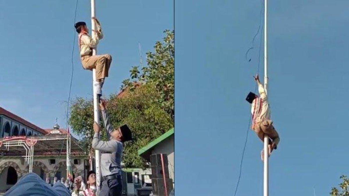 Aksi Sakha Ardiansyah memanjat tiang bendera saat upacara Kemerdekaan RI ke-73