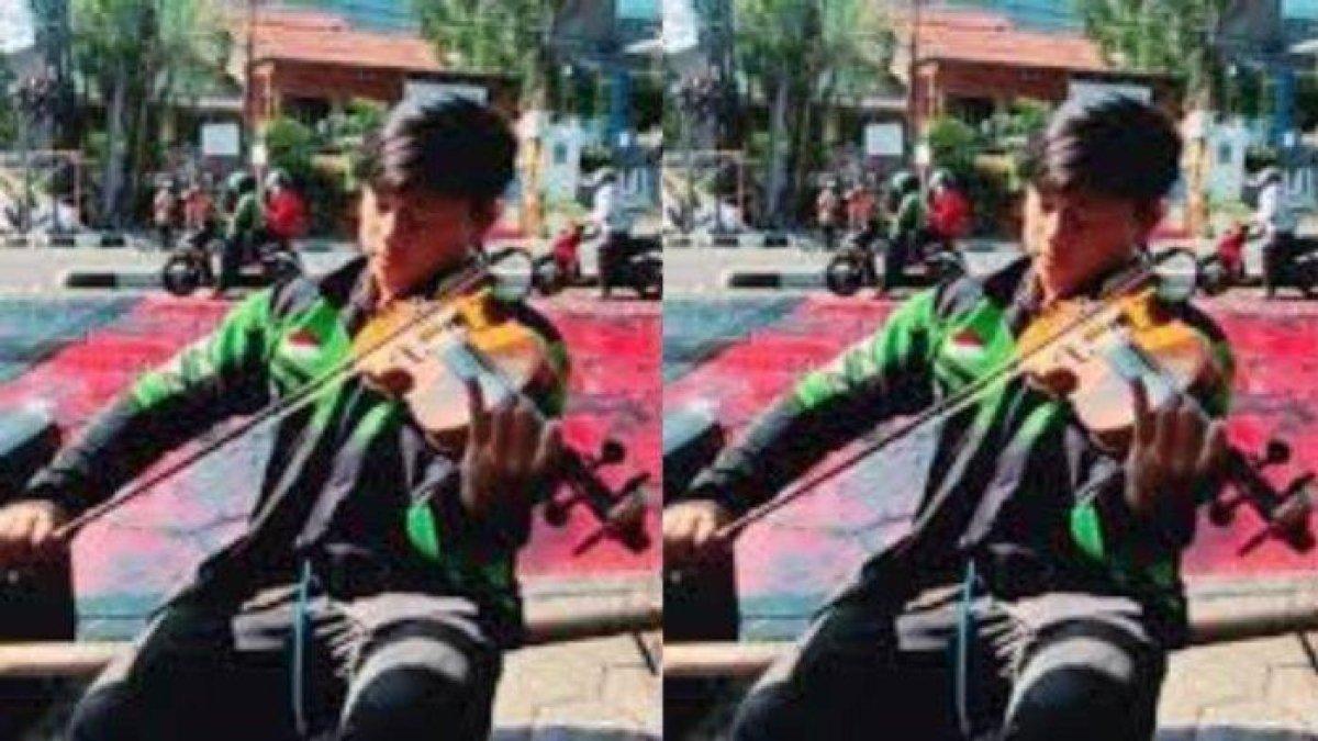 Driver Ojol bernama Rismawanda main biola di lampu merah, ternyata juara Indonesia Mencari Bakat.