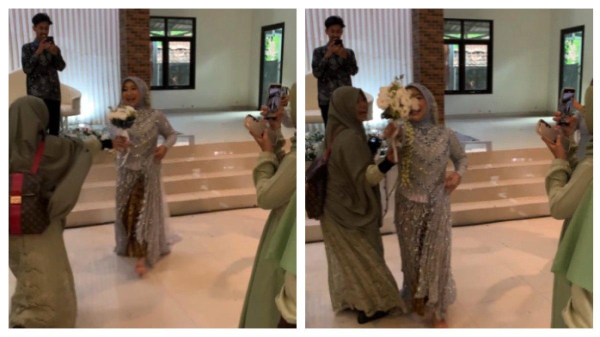Momen emak-emak nyrobot mau ambil buket bunga dari pengantin cewek