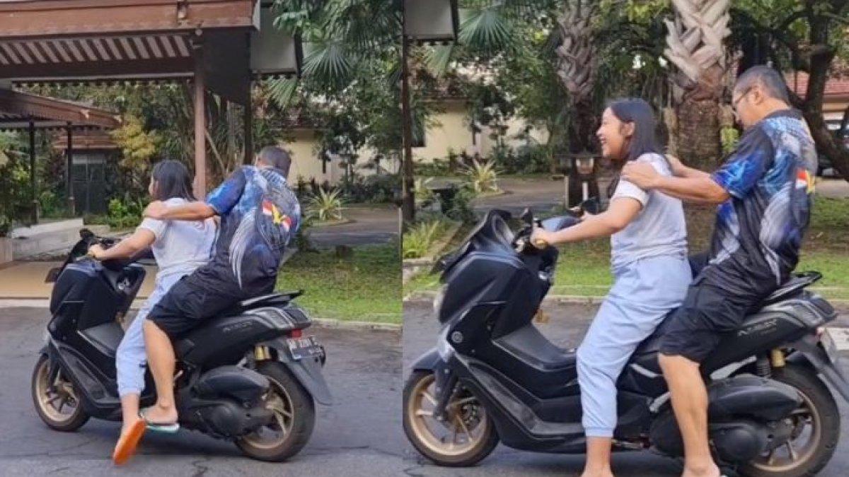Gaya Khirani naik sepeda motor bonceng sang ayah.