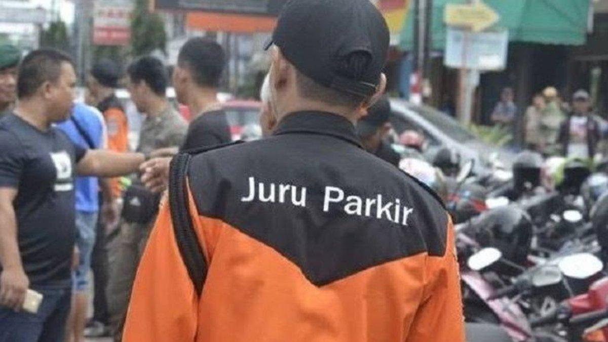 Ilustrasi juru parkir.