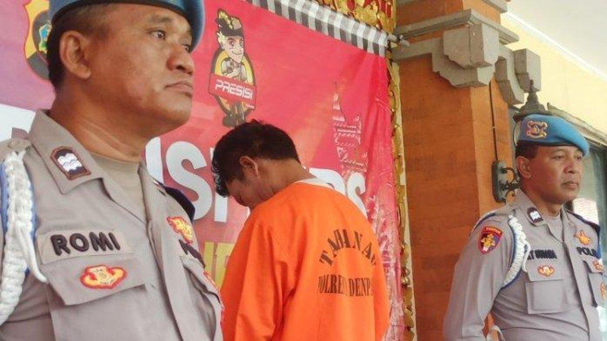 LUJ (41) ditangkap polisi usai menganiaya seorang pengendara sepeda motor
