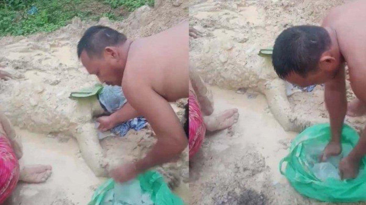 Malik, dikubur dengan lumpur usai tersambar petir, Minggu (5/11/2023).