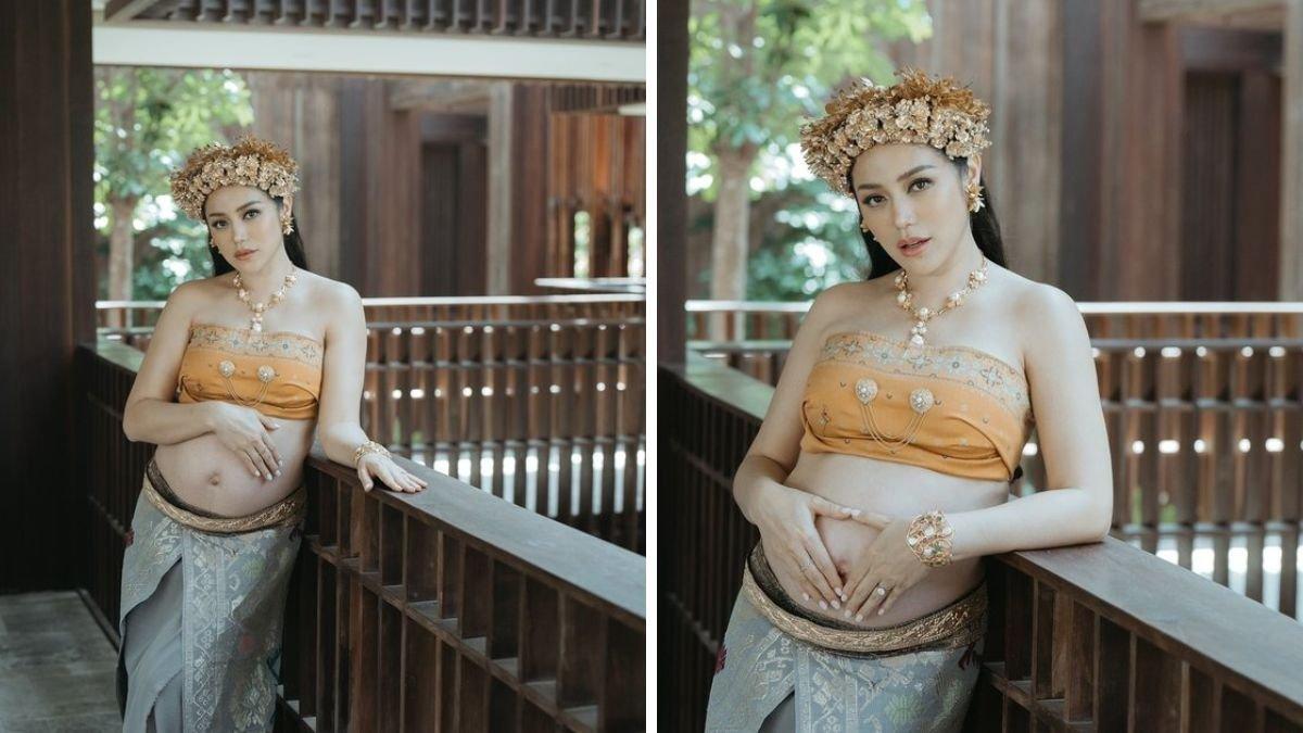 Mengenakan pakaian adat Bali