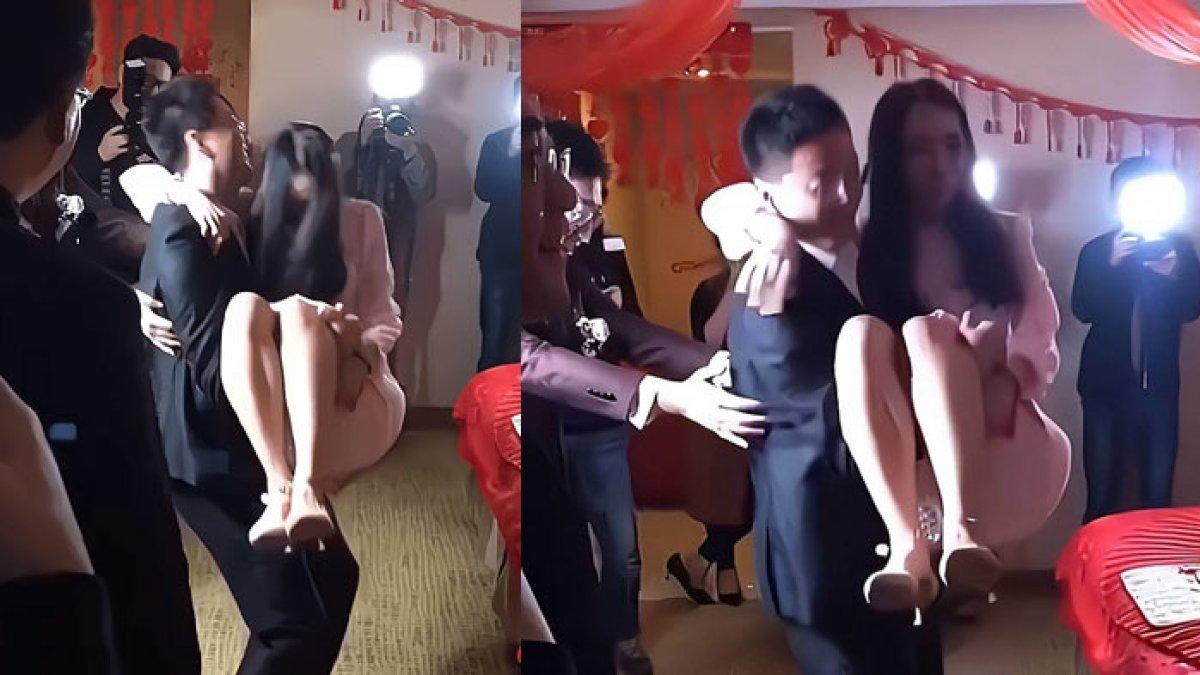 Pengantin pria terima tantangan menggendong pengiring pengantin di depan istri