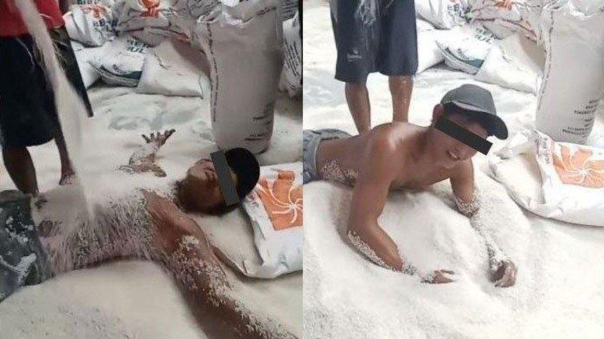 Pria mandi beras Bulog viral di media sosial. Nasib kini dipecat