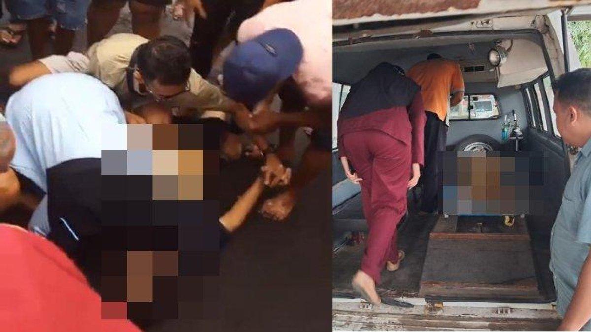 Proses evakuasi bapak dan anak asal Gresik digulung ombak di Pantai Paseban Jember saat libur Lebaran, Kamis (11/4/2024).