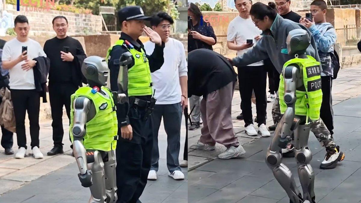 ROBOT AI - Robot PM01, berjalan bersama petugas polisi dan dengan antusias berjabat tangan dengan orang yang lewat, foto diambil dari YouTube CGTN, 5 Maret 2025.