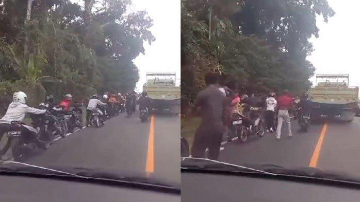 Rombongan sunmori disuruh menuntun motornya karena warga merasa terganggu
