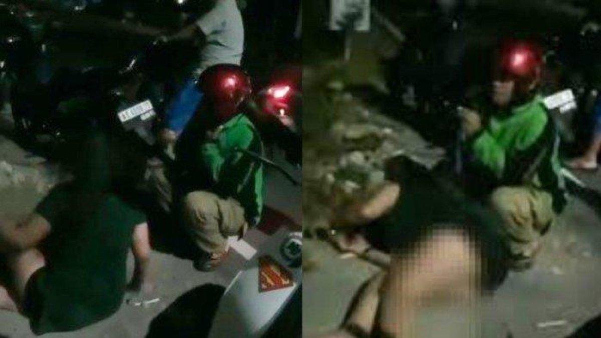 Seorang driver ojek online kebingungan karena ulah penumpangnya.Bagaimana tidak, penumpangnya mendadak minta turun dari sepeda motor dan mengamuk. (Instagram @infoponorogo)