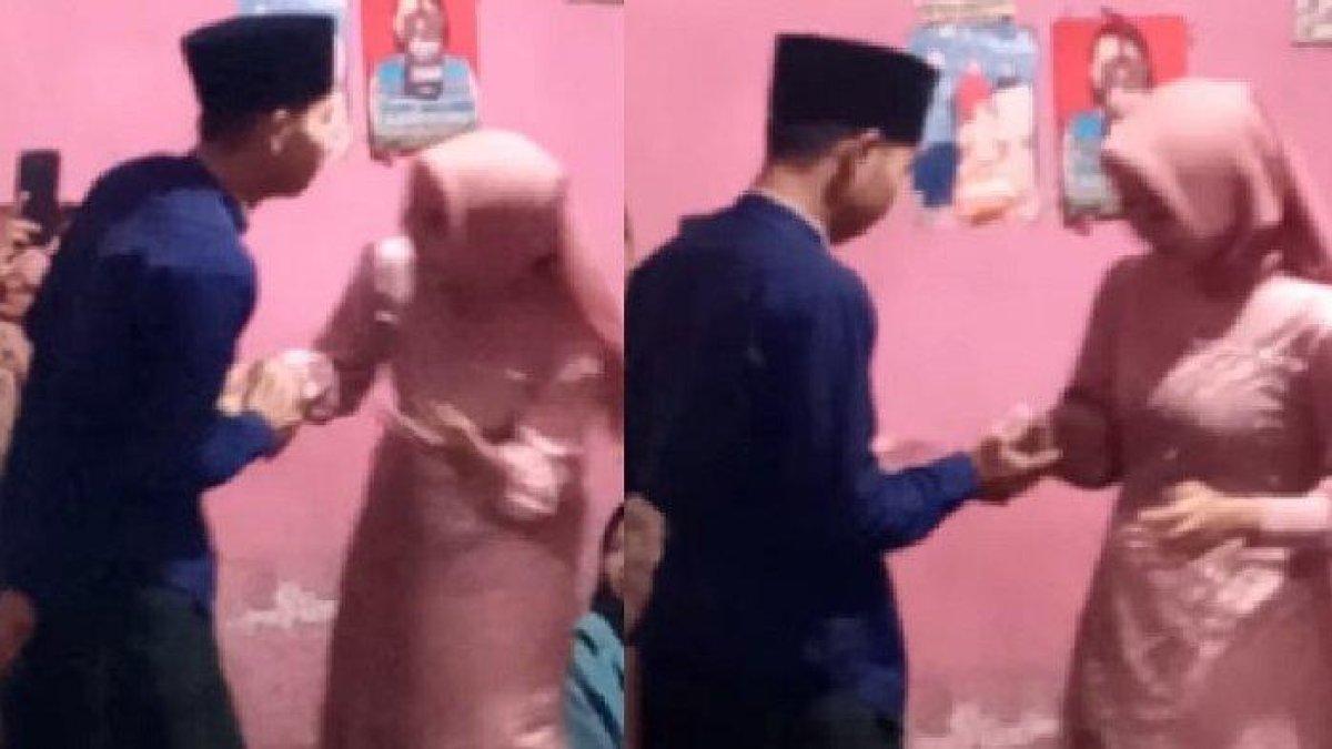 Seorang pemuda yang tak sadar hendak mencium tunangan nya di hadapan keluarga