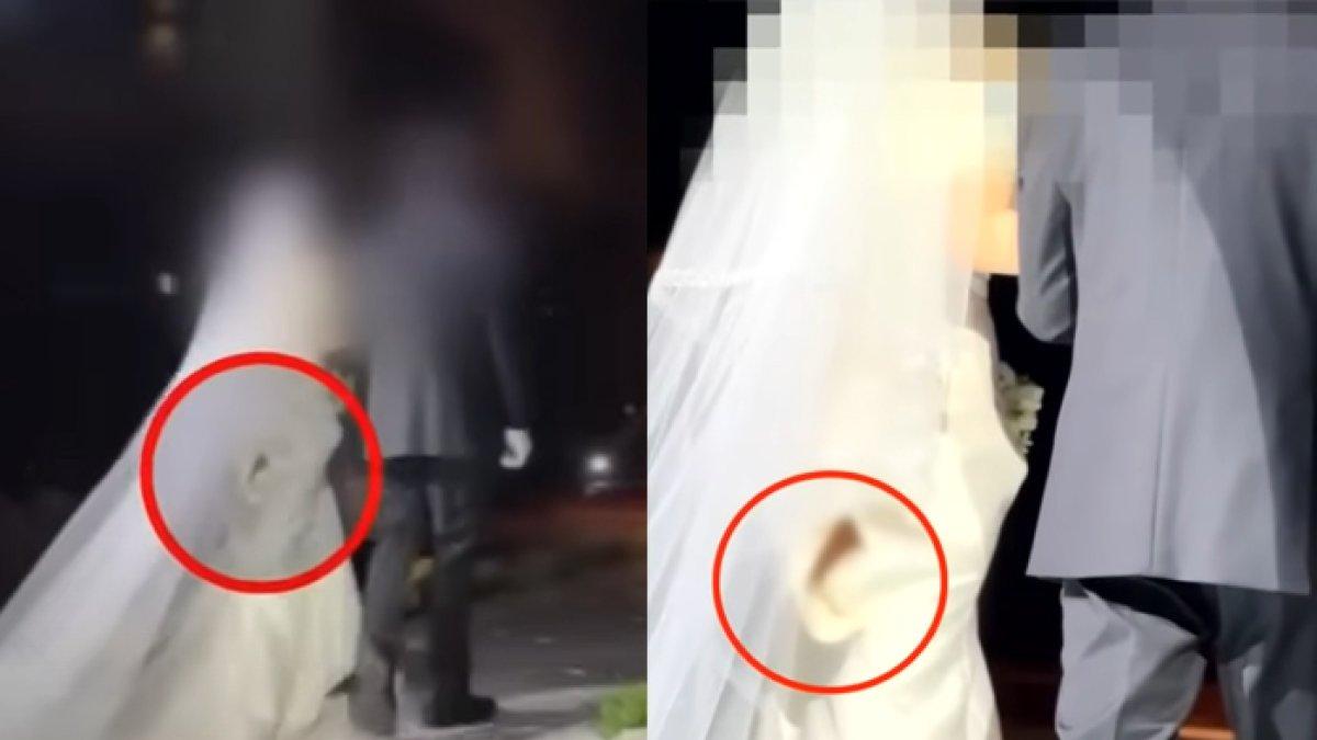 Seorang pengantin wanita menanggung malu karena gaun yang dipakai robek, bagian belakangnya pun kelihatan