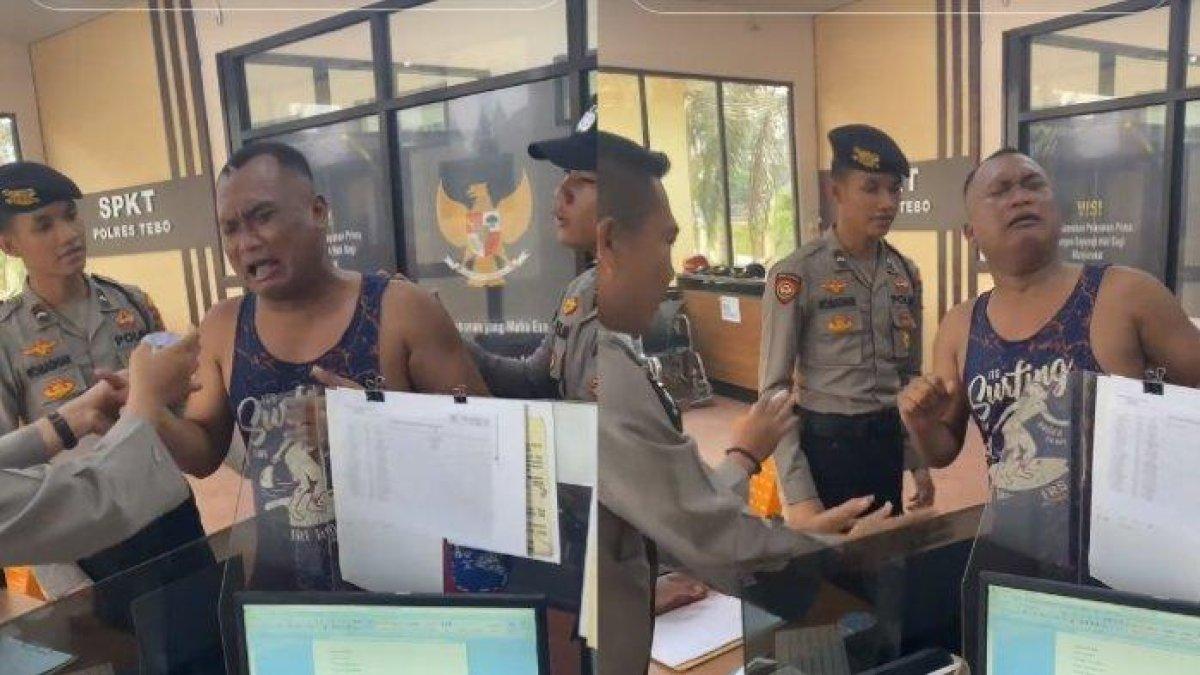 Seorang pria bertubuh kekar menangis di Polres Tebo melaporkan ayam hilang