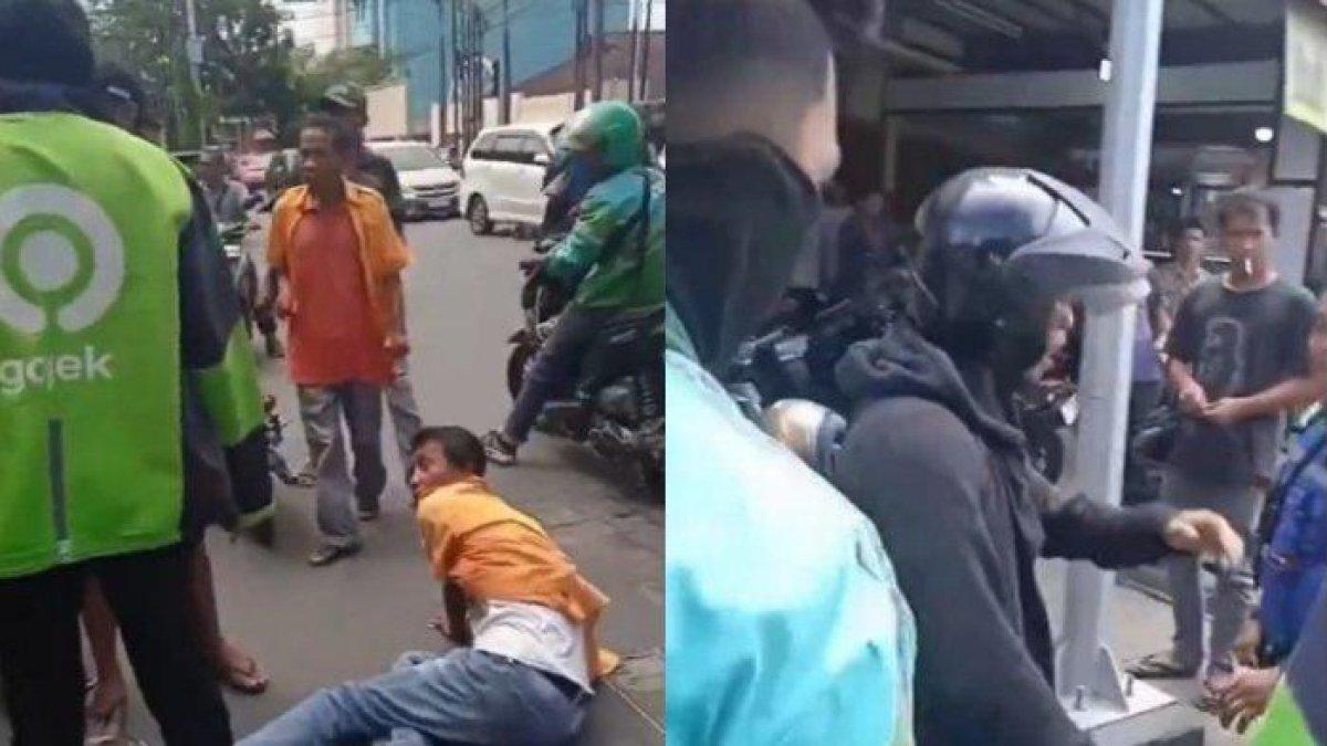 Seorang tukang parkir di Jalan Setia Budi, Jakarta dihajar sampai tersungkur oleh seorang pemuda gara-gara uang seribu rupiah, alhasil pelaku nyaris diamuk oleh sejumlah driver ojek online