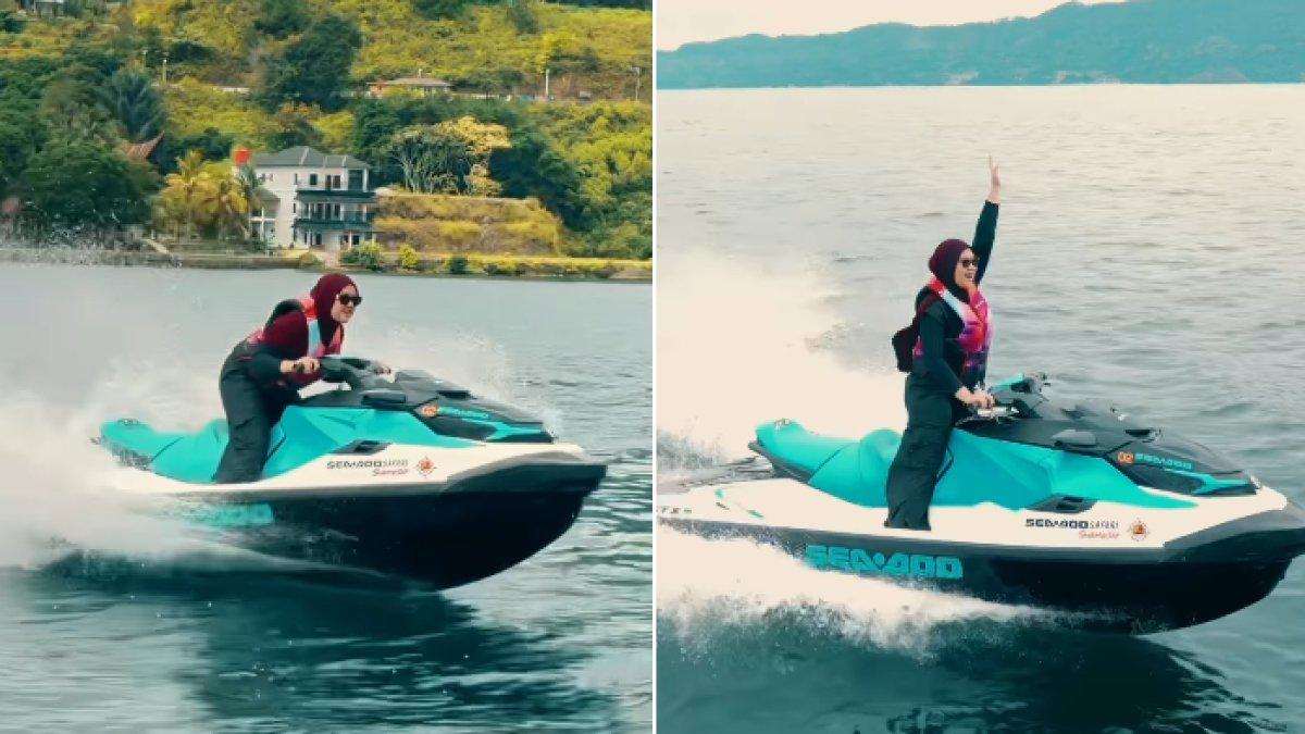 Shania Gudono adik Erina Gudono dengan lincah bermanuver dengan jetski di Danau Toba