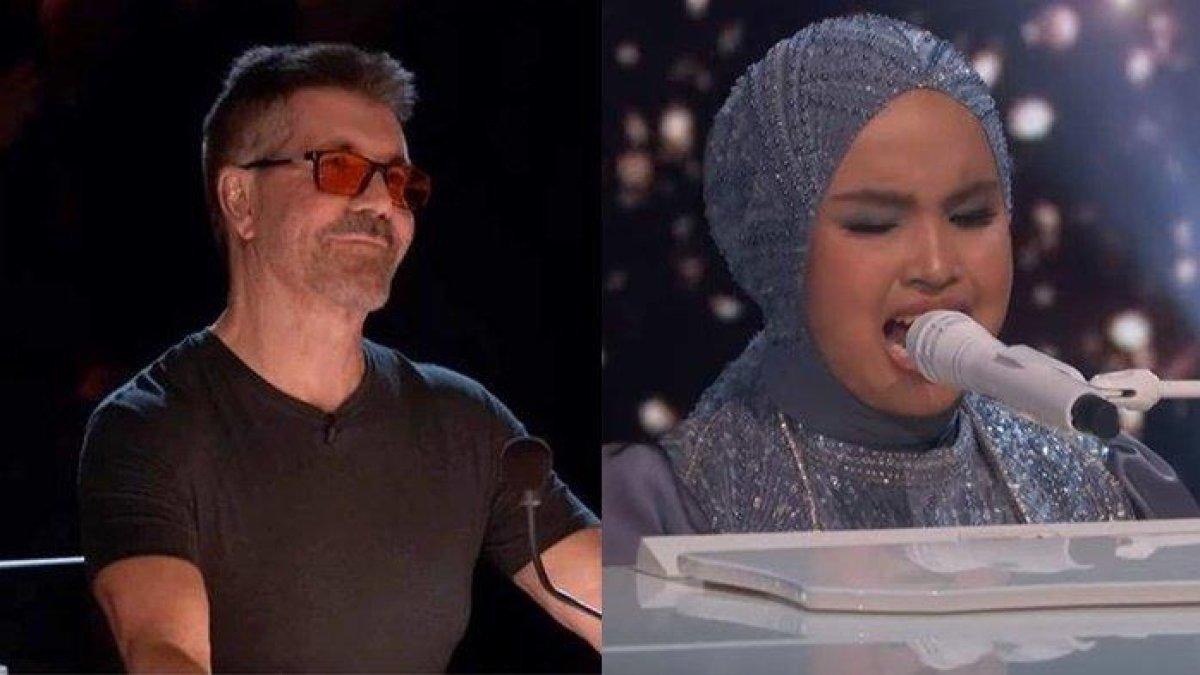 Simon Cowell tersenyum bangga dengan penampilan penyanyi tunanetra asal Indonesia, Putri Ariani lagi-lagi berhasil membuat takjub dunia di panggung Final ajang pencarian bakat America's Got Talent 2023