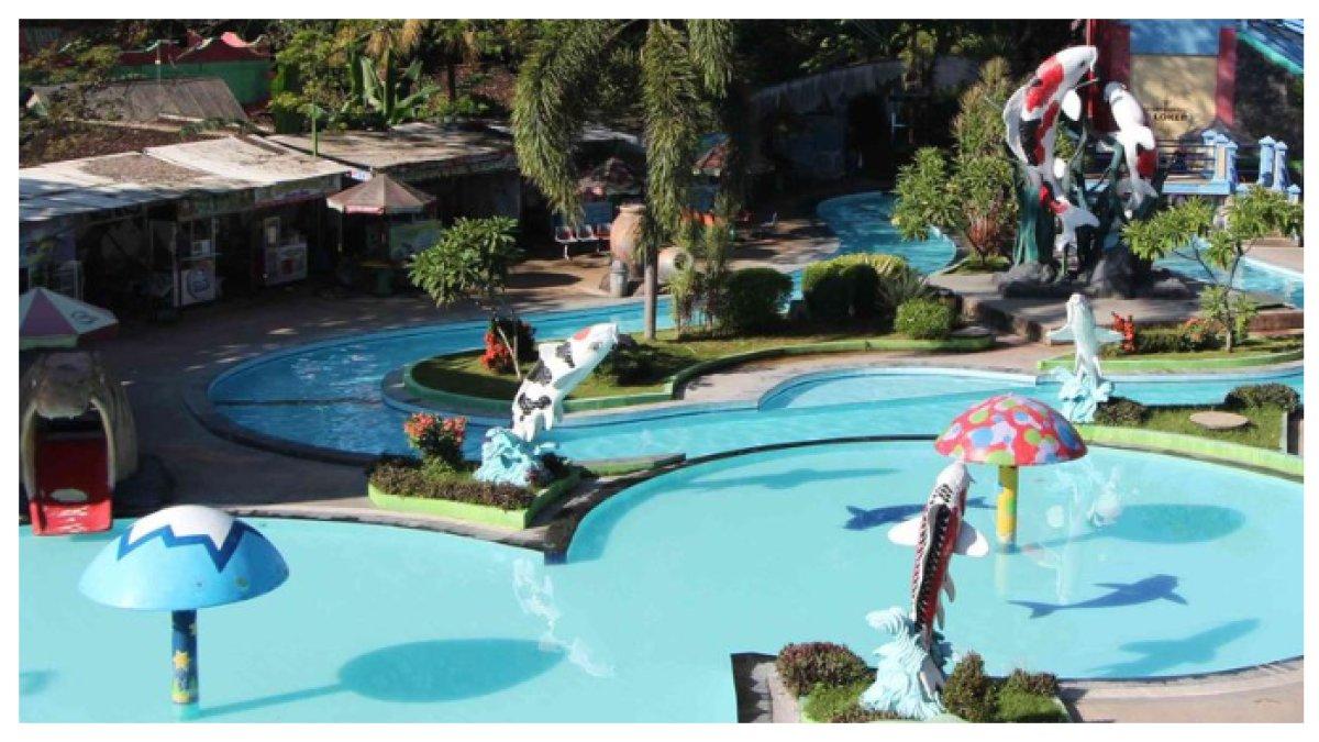 WISATA SUMBER UDEL WATERPARK BLITAR - Sumber Udel Waterpark adalah wisata kolam renang di Kota Blitar, Jawa Timur, dengan fasilitas lengkap dan konsep waterpark yang menyenangkan untuk keluarga.
