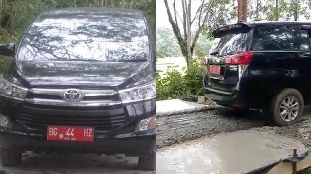 Mobil dinas terobos jalanan di cor