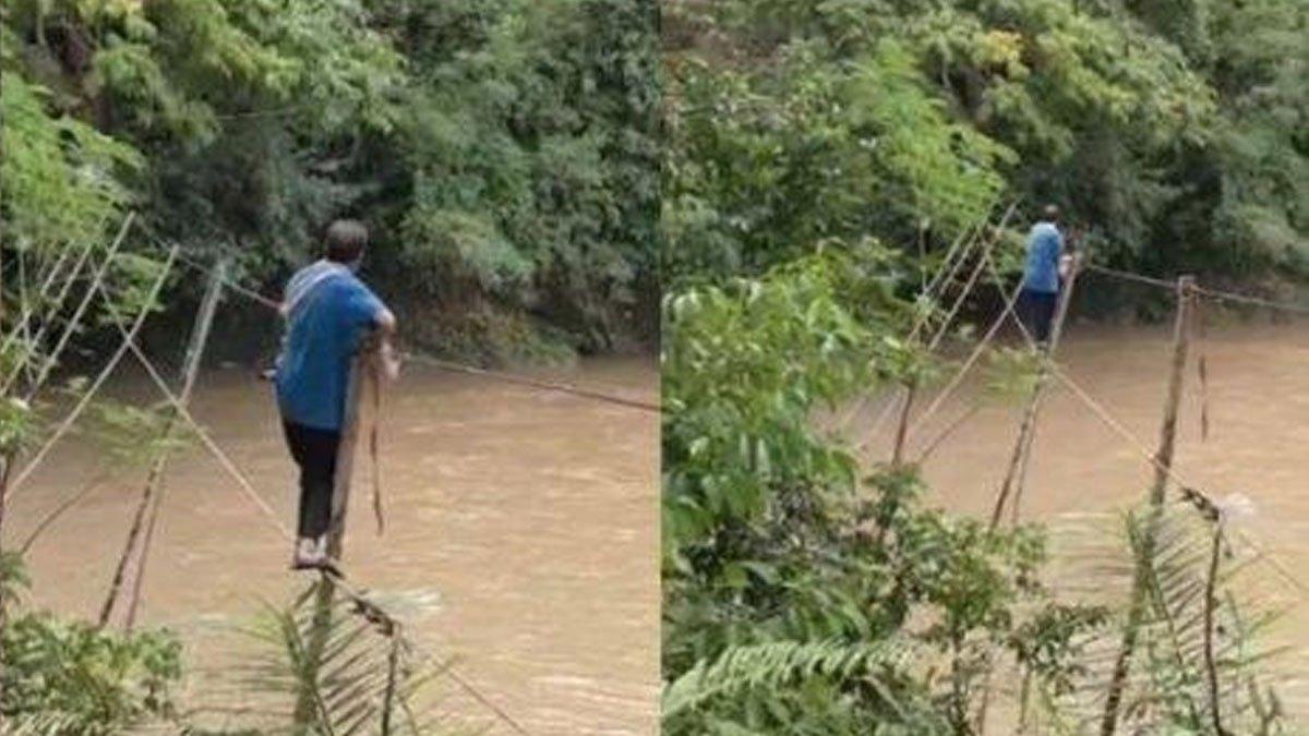 Detik-detik Seorang Pria Menyebrang Sungai Sambil Gendong Anak Kecil.