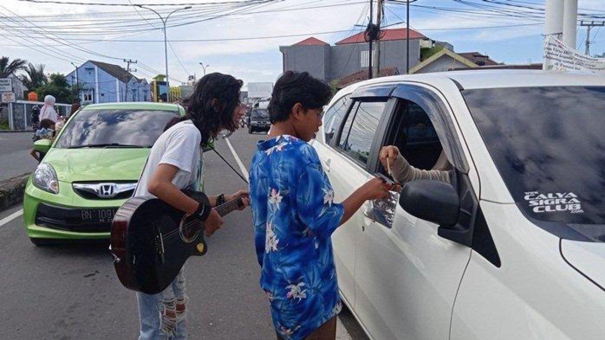 mengamen foto