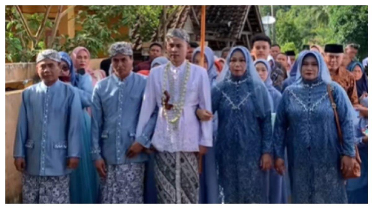 VIRAL VIDEO PENGANTIN - Pengantin pria ini didampingi dua ayah dan dua ibu di hari pernikahannya. Ternyata kedua orang tua kandung sudah cerai lama, dan masing-masing menikah.