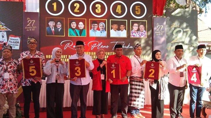 KPUD Kota Baubau, Sulawesi Tenggara, menetapkan nomor urut lima pasangan Calon Wali Kota dan Wakil Wali Kota Baubau, Senin (23/9/2024).