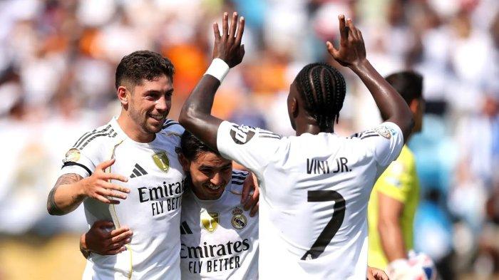SELEBRASI MADRID - Para pemain Real Madrid, Federico Valverde, Brahim Diaz, dan Vinicius Junior merayakan gol ke gawang Pachuca pada matchday kedua grup H Piala Dunia Antarklub di Bank of America Stadium, Senin (23/6/2025). (Website FIFA - 23/6/2025)
