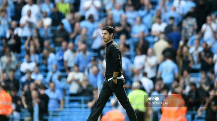 Manajer Arsenal asal Spanyol Mikel Arteta bereaksi pada peluit akhir pertandingan sepak bola Liga Premier Inggris antara Manchester City dan Arsenal di Stadion Etihad di Manchester, barat laut Inggris, pada 28 Agustus 2021.