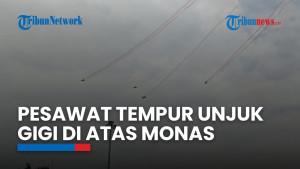 Pesawat Tempur F-16 Fighting Falcon Melintas di Atas Monas, Bendera Merah Putih Berkibar di Langit