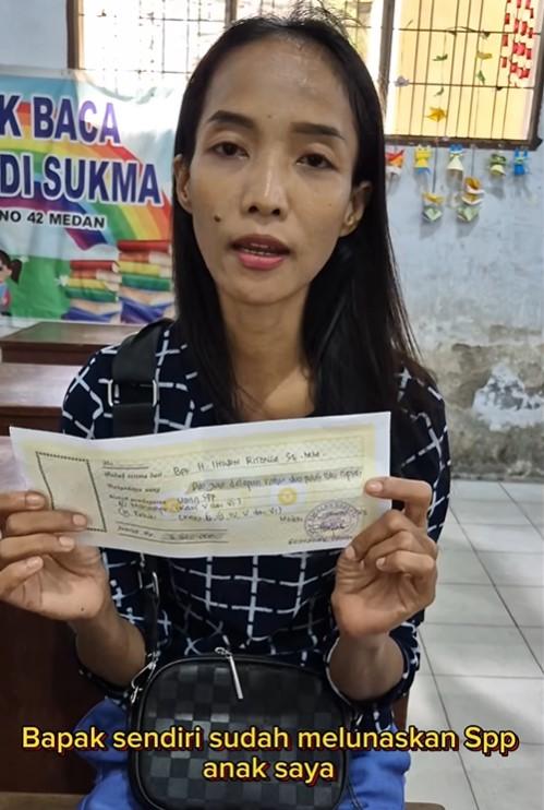 Ibu MI, Kamelia, mengucapkan terima kasih kepada Ihwan Ritonga karena telah melunasi SPP anaknya.