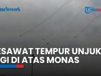 Pesawat Tempur F-16 Fighting Falcon Melintas di Atas Monas, Bendera Merah Putih Berkibar di Langit