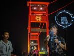 Konten-Kreator-Ngamen-Online-di-Jembatan-Ampera_20241001_135754.jpg