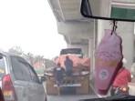 Tangkapan-layar-video-aksi-bajing-loncat-di-Jalan-raya-bekasi-Cakung.jpg