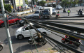 kabel-melintang-bahayakan-pengendara-di-surabaya_20240525_200140.jpg