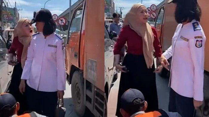 Sebuah video aksi pemberontakan wanita yang tak terima mobilnya digembok oleh petugas Dishub Kota Makassar menjadi viral di media sosial.