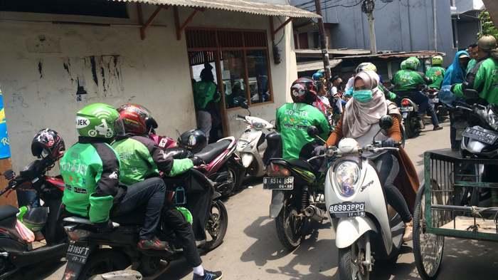 Ilustrasi ojek berbasis aplikasi online.
