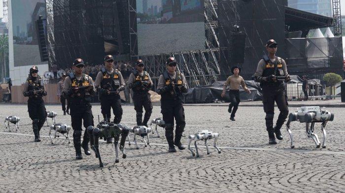 ROBOT ANJING-K9 POLRI - Dalam rangka perayaan HUT ke-79 Bhayangkara, Kepolisian Negara Republik Indonesia (Polri) memperkenalkan 25 unit robot humanoid dan robot anjing (K9). Irwasum Polri, Komjen Dedi Prasetyo mengatakan, keberadaan teknologi ini menjadi bukti komitmen Polri dalam modernisasi perangkat tugas untuk meningkatkan efisiensi, keselamatan personel, dan efektivitas pelayanan publik.