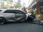 Mobil-listrik-alami-kecelakaan-di-Jalan-Rasuna-Said.jpg